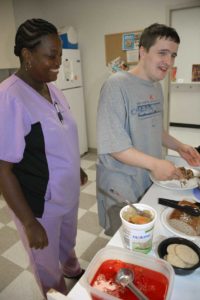 cna assisting with daily living skills cooking