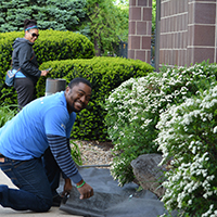 volunteer working in garden area