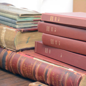 stack of old historical books