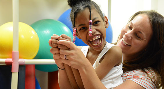 Girl and lady having fun working.