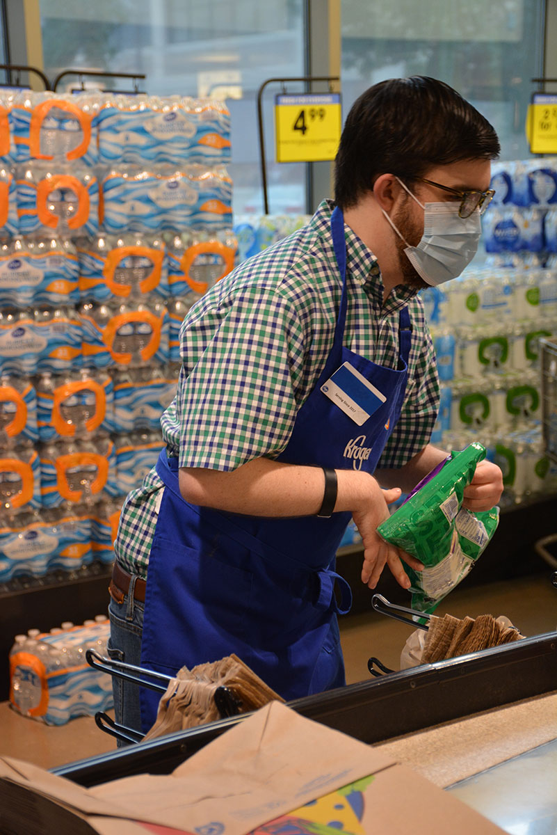 Man working at a grocery store.