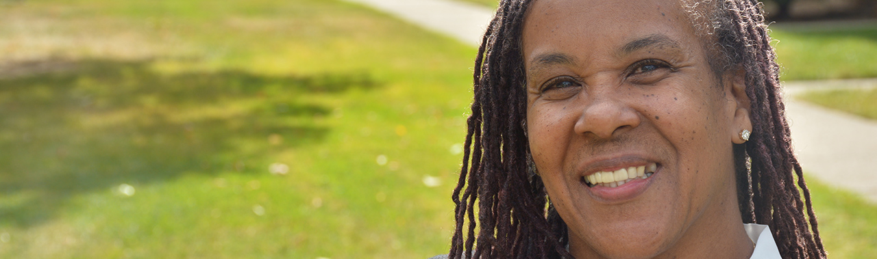 a close-up of a smiling woman's face