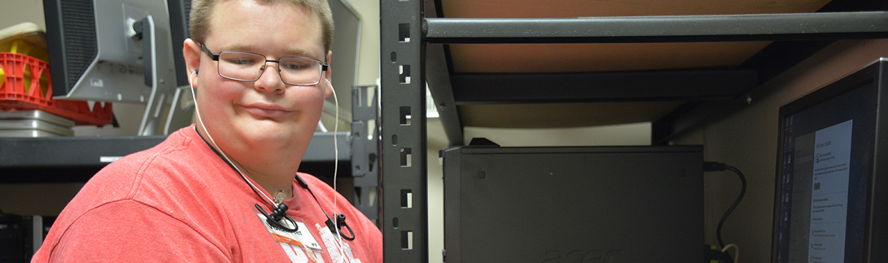 young man working on computers