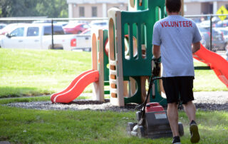 volunteer working in playground