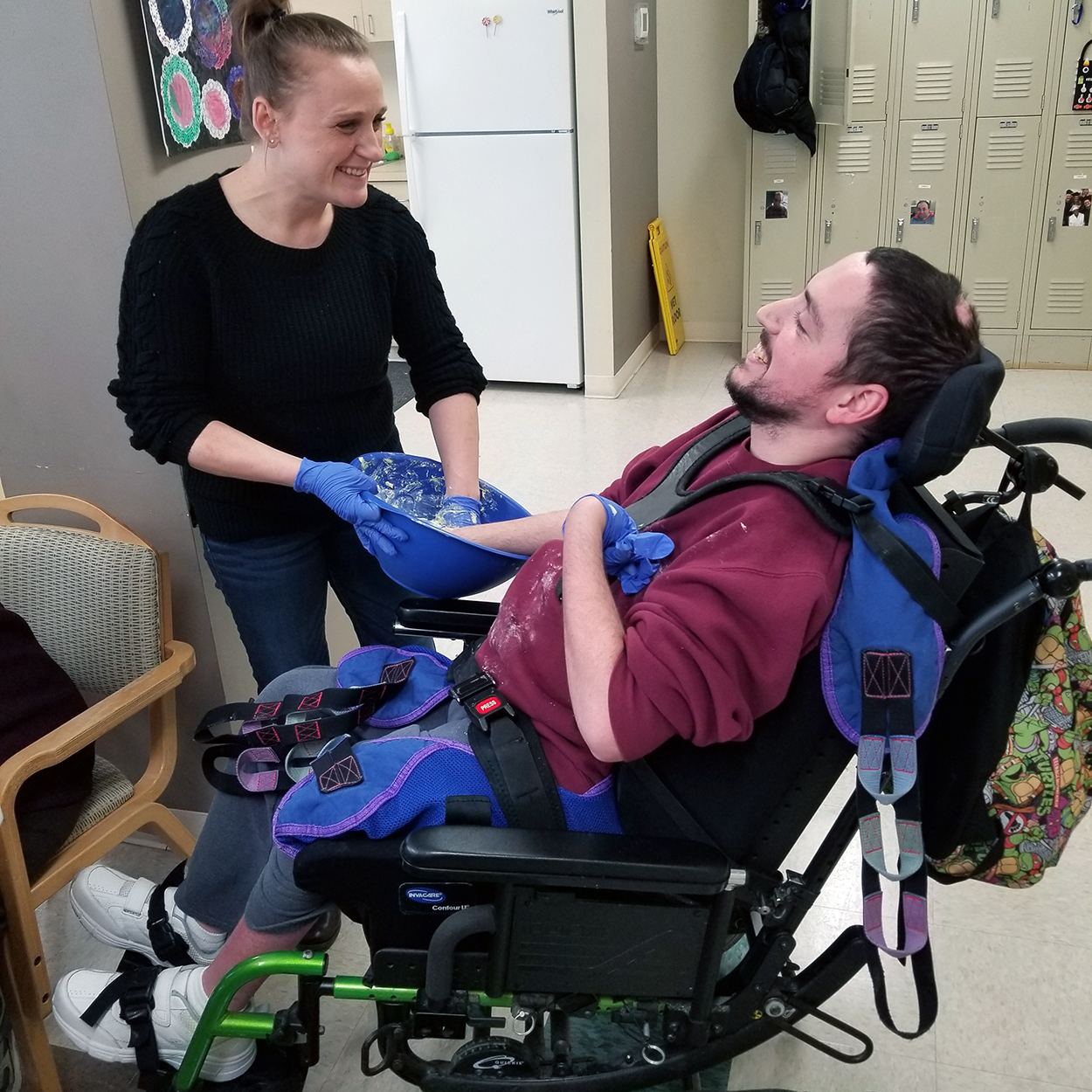 recreational therapist building strength with person