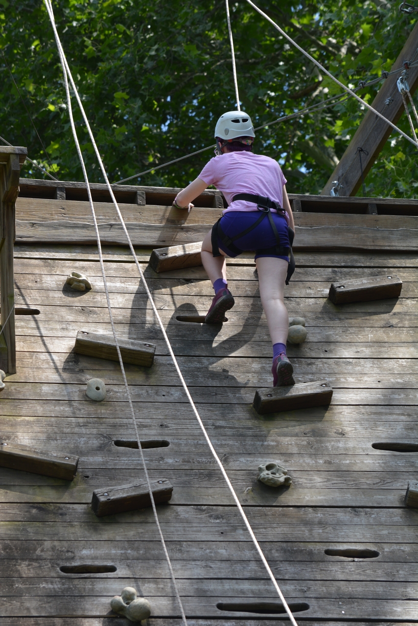 camp rocks (3) a child climbing on a climbing wall