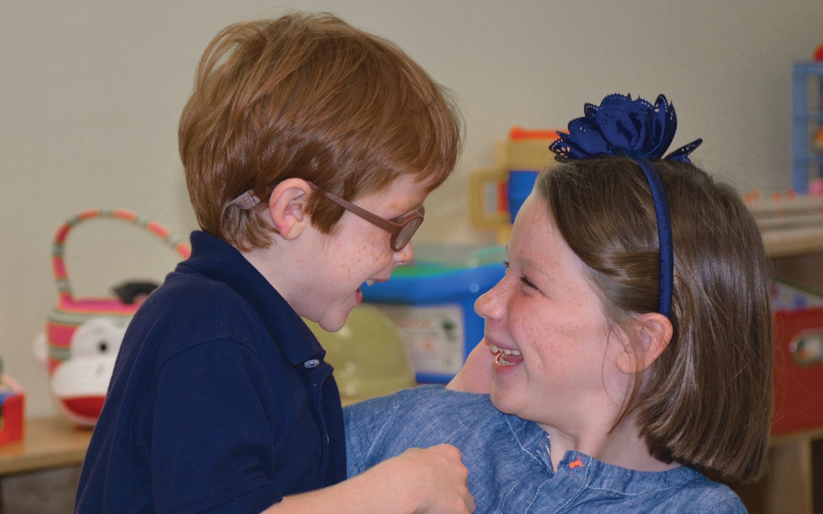 two kids laughing