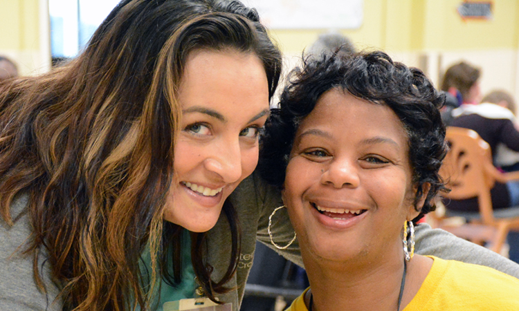 image of Tara with a participant in adult day services
