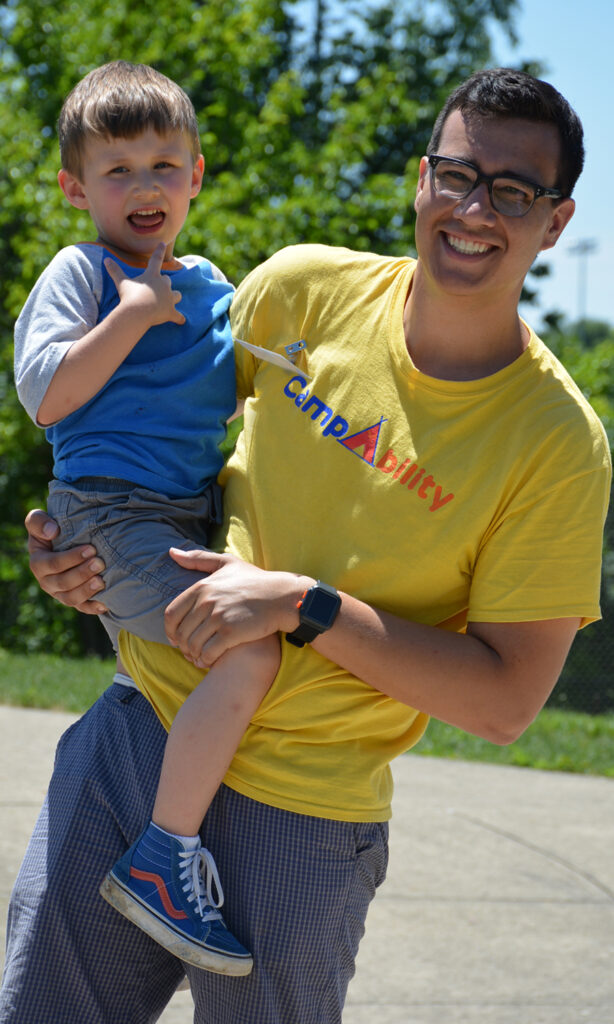 Tim Blanusa with a camper at CampAbility