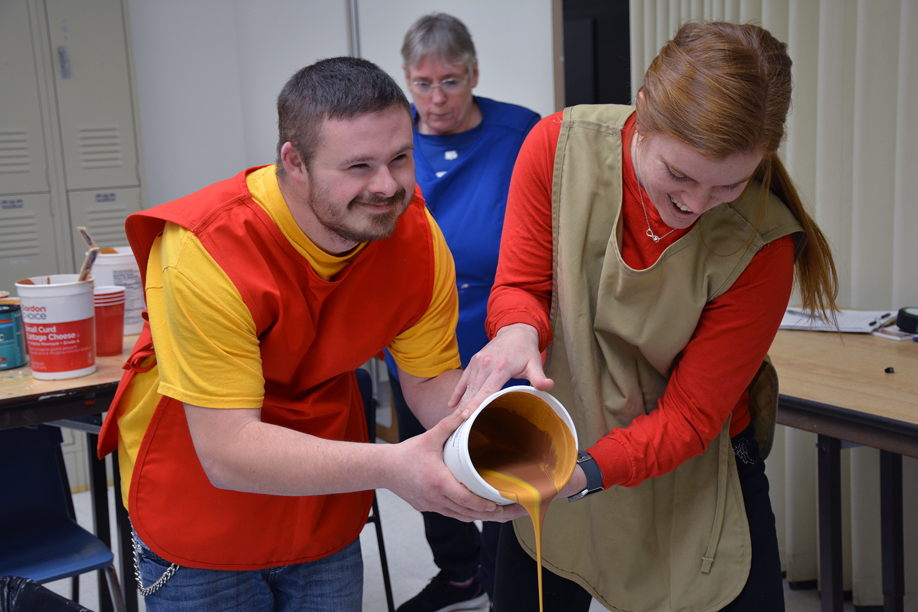 Adult Day staff and participant creating art